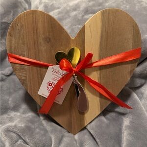Heart-Shaped Wood Cutting Board with Red Ribbon